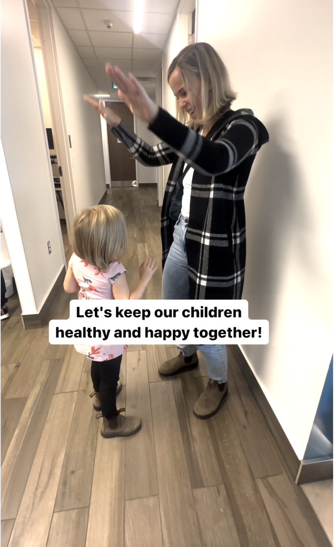 Mother and daughter celebrating after daughter received vaccine