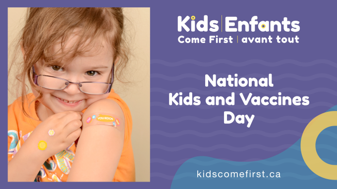 Smiling girl with Band-Aid on arm after getting vaccine